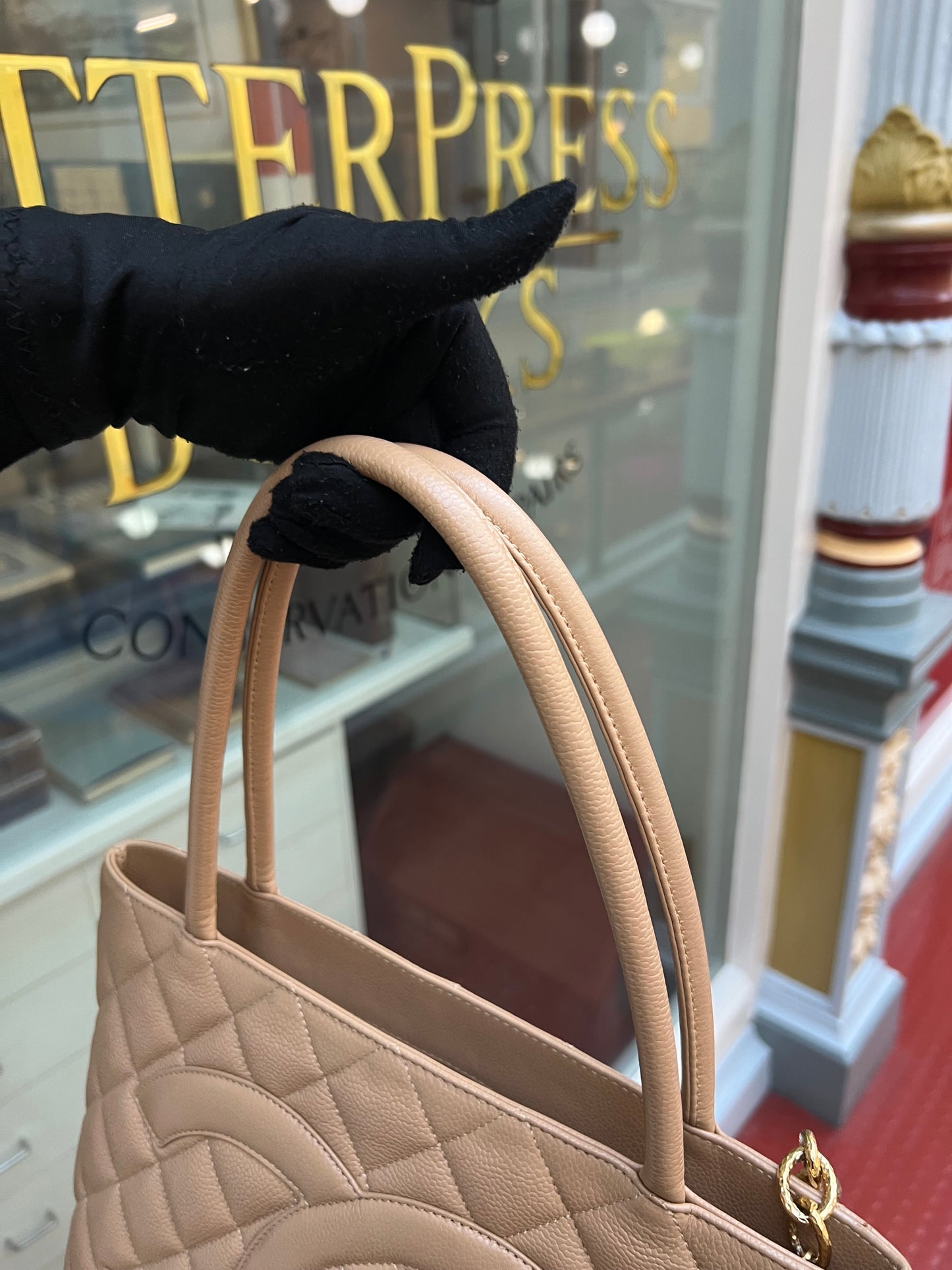 Pre-loved Chanel Caviar Medalion Tote Beige