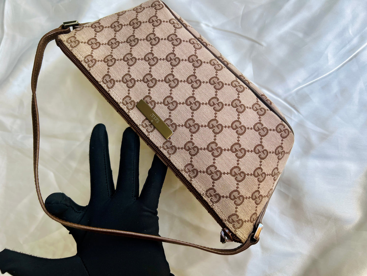 Pre-loved Gucci vintage GG Canvas Boat Baguette Bag Brown