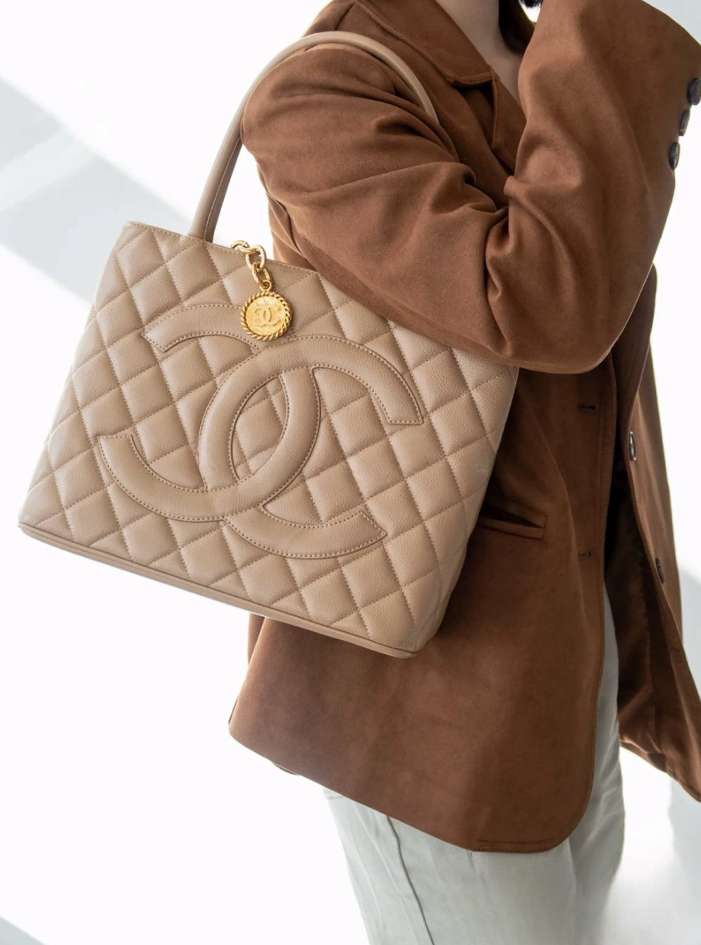 Pre-loved Chanel Caviar Medalion Tote Beige