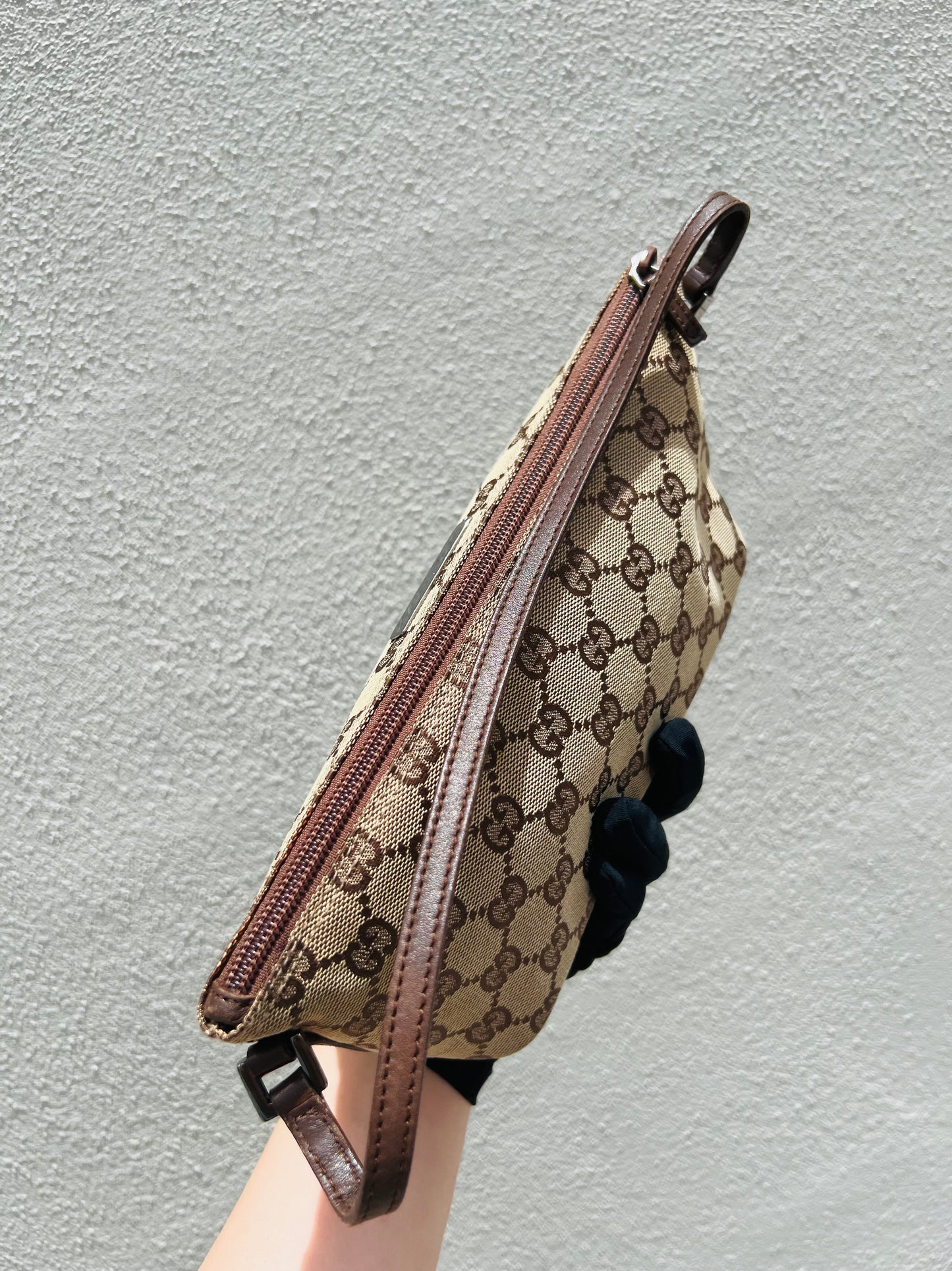 Pre-loved Gucci vintage GG Canvas Boat Baguette Bag Brown