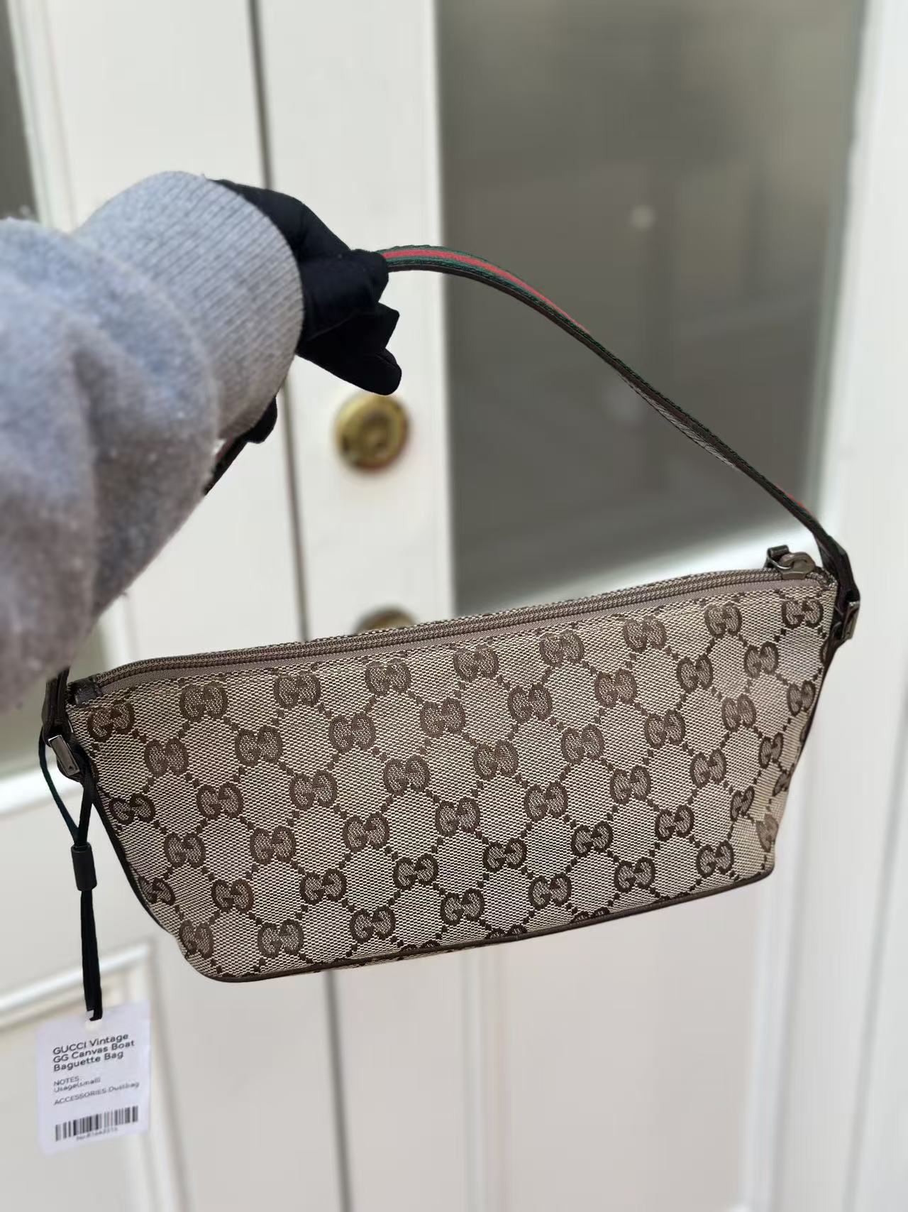 Pre-loved Gucci vintage GG Canvas Boat Baguette Bag