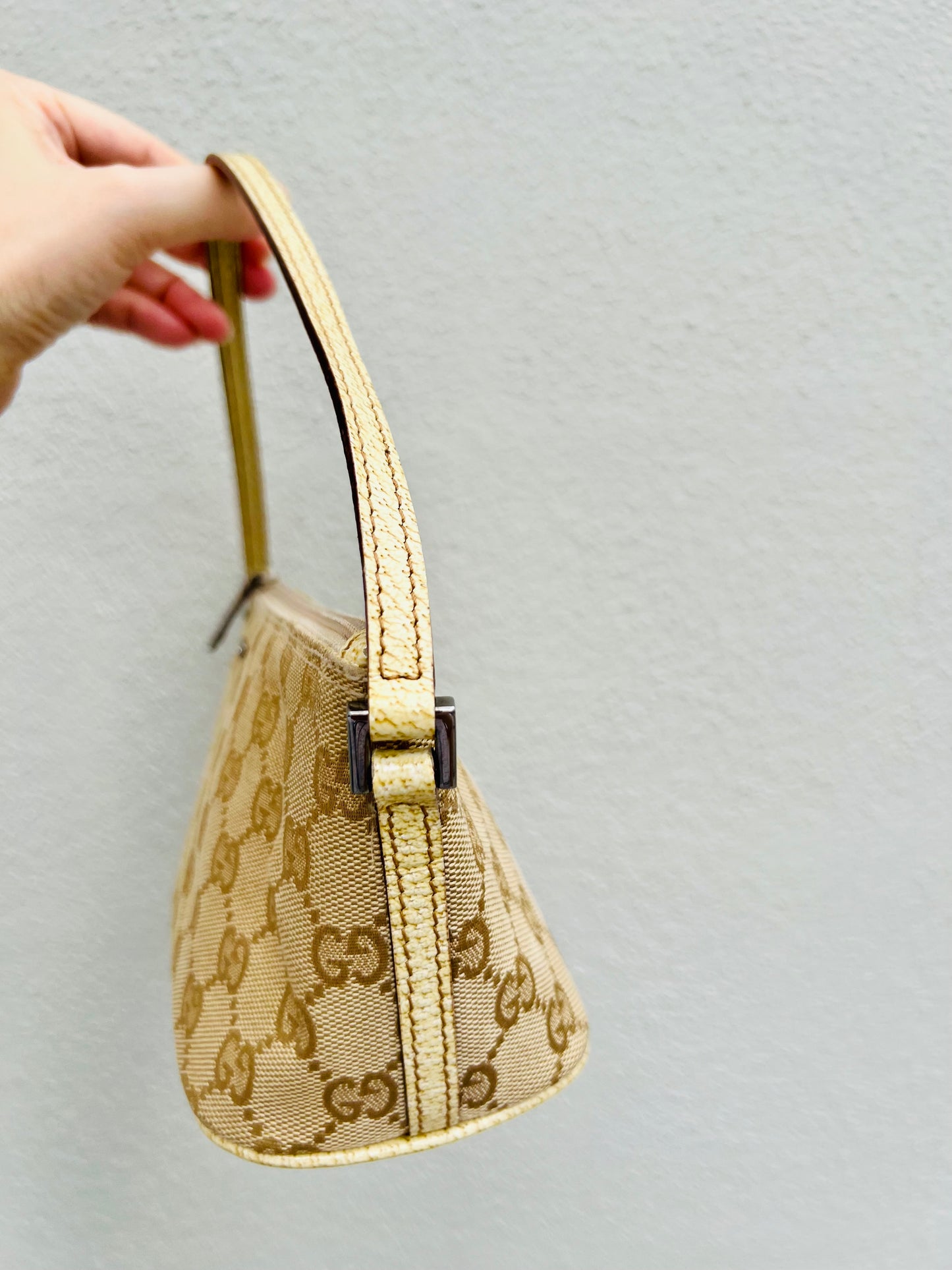 Pre-loved Gucci vintage GG Canvas Boat Baguette Bag Soft Lemon Sorbet Tone