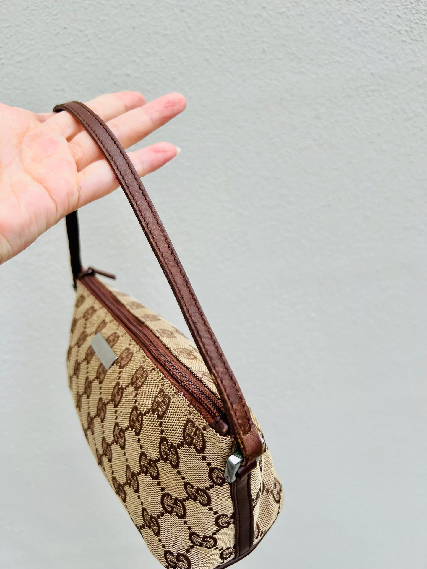 Pre-loved Gucci vintage GG Canvas Boat Baguette Bag Brown