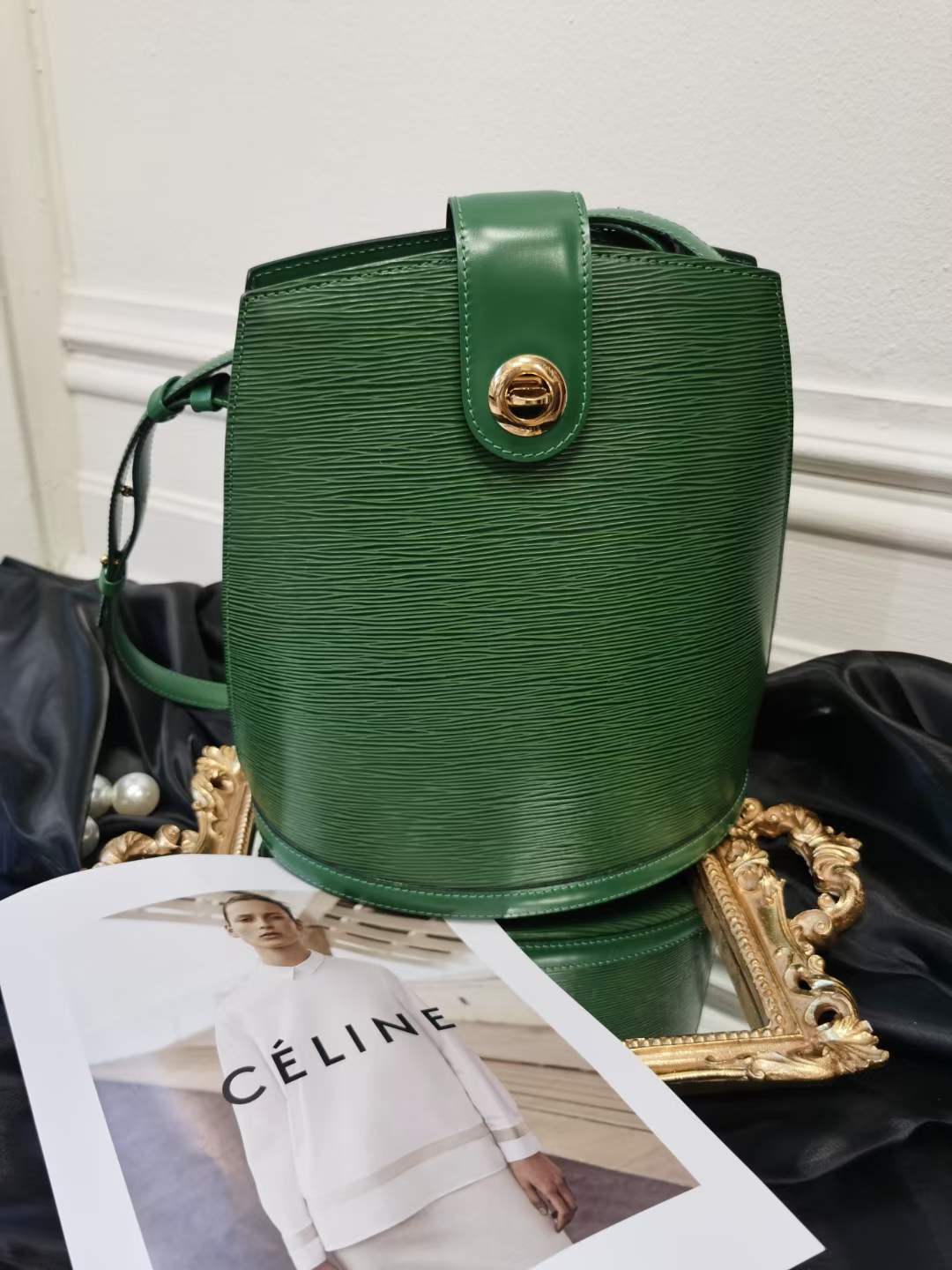 Louis Vuitton Vintage Cluny Green Epi Leather Bucket Shoulder Bag –  Amarcord Vintage Fashion