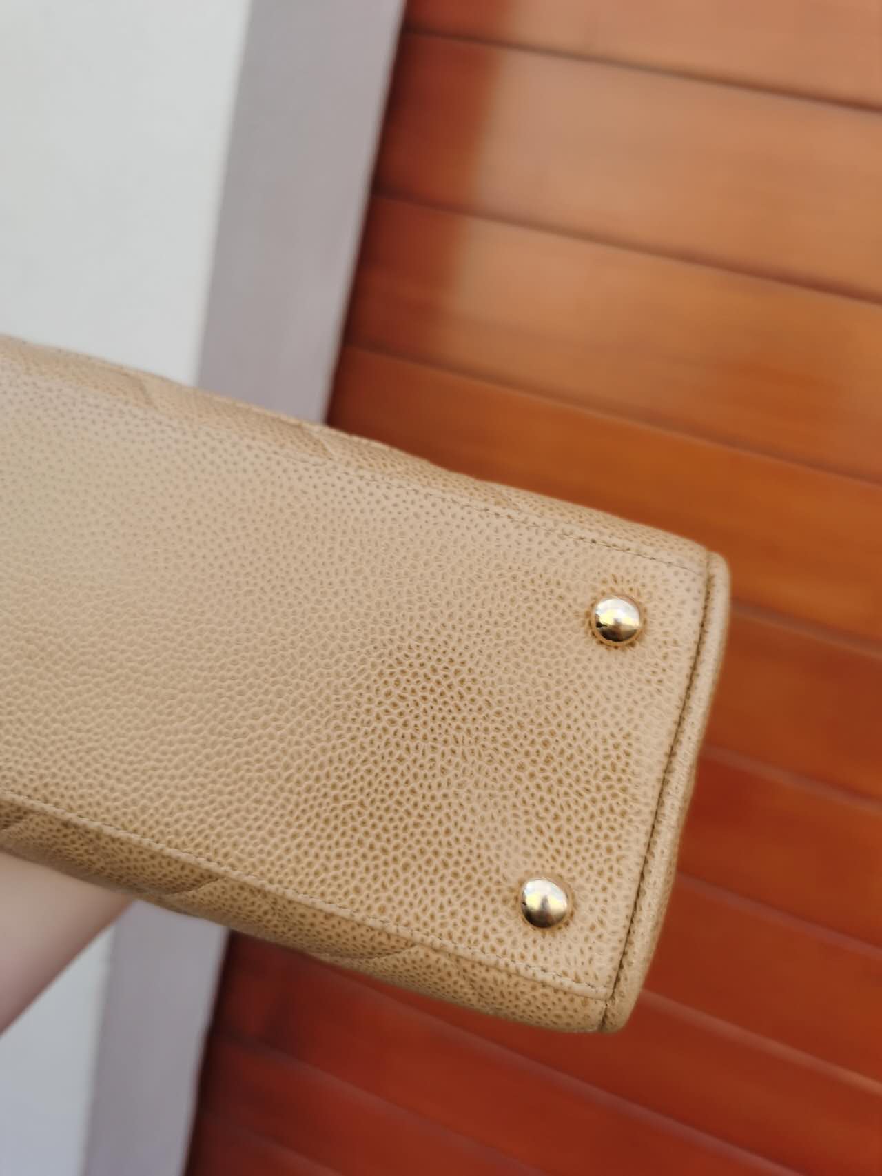 Pre-loved Chanel Vintage Beige Caviar Handbag