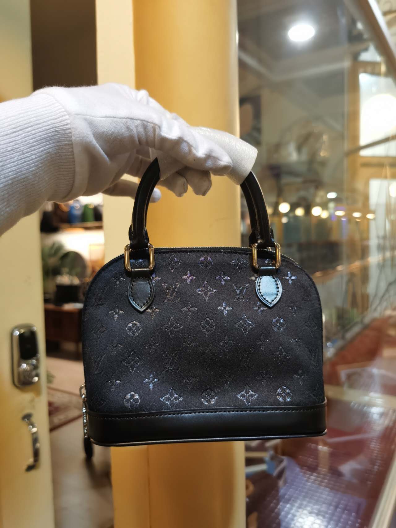 Pre-loved Louis Vuitton Mini Silk Alma Handbag Black