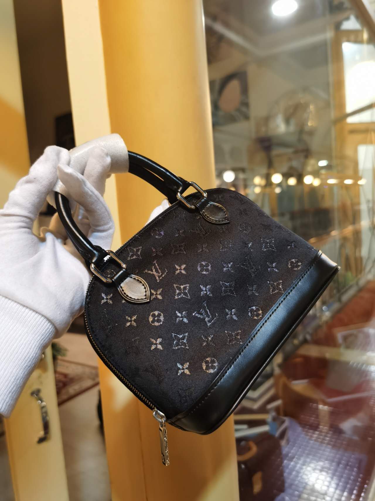 Pre-loved Louis Vuitton Mini Silk Alma Handbag Black